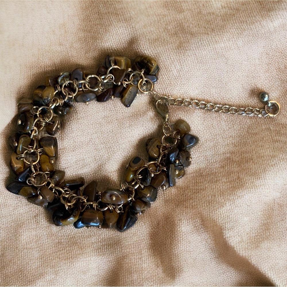 Multi stone tigers eye bracelet. Gold tone.